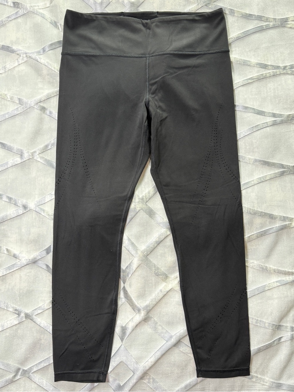 Athleta Elation Lasercut Tight Leggings.  Black size Large.